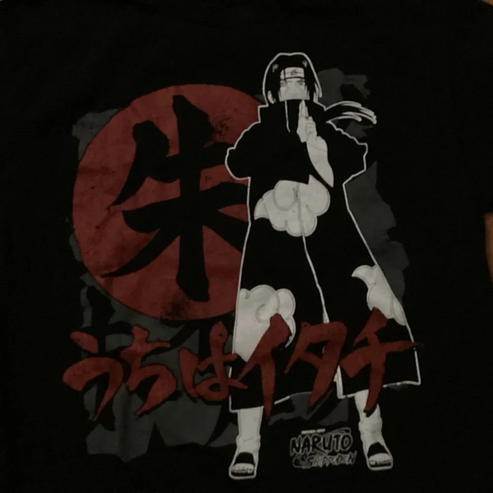 Naturo. 100% cotton. Tshirt. Size M. Black/red/white. Used, great condition. - Picture 2 of 3